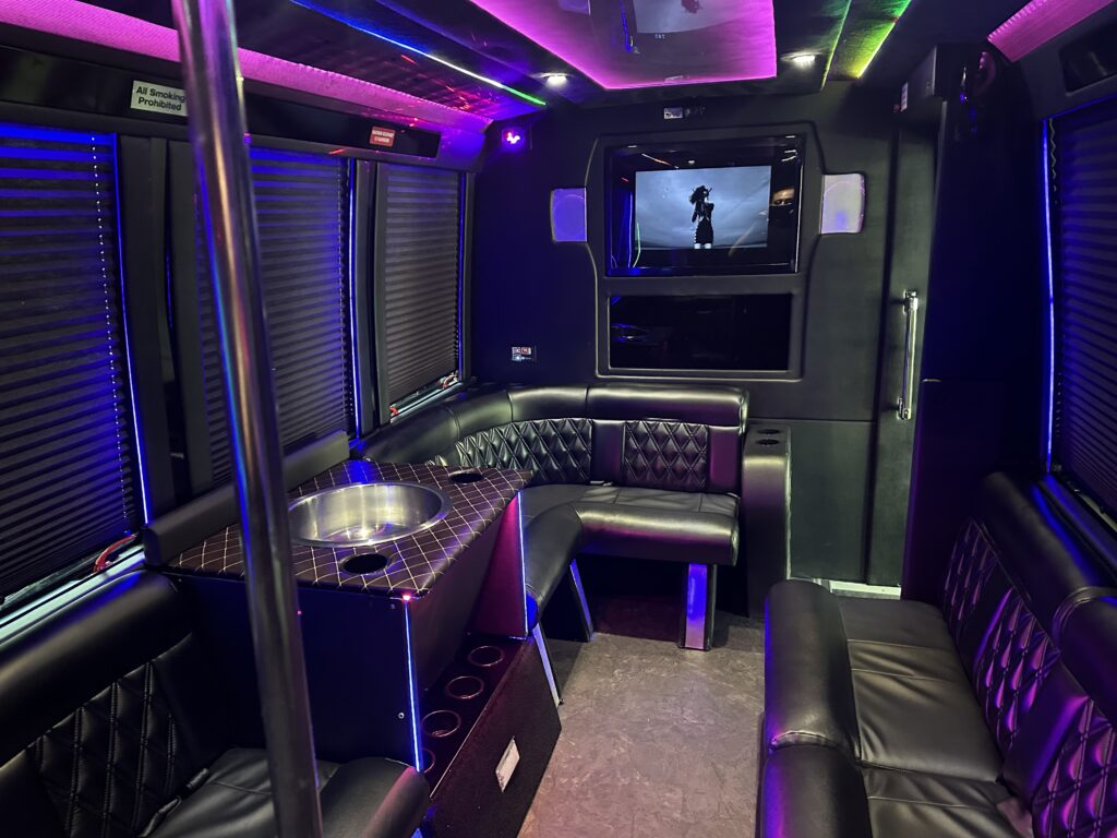 Black 14 passenger Sprinter Van